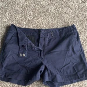 Navy ADIDAS shorts.